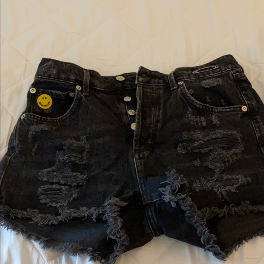 Distressed Agolde Jean shorts with patches